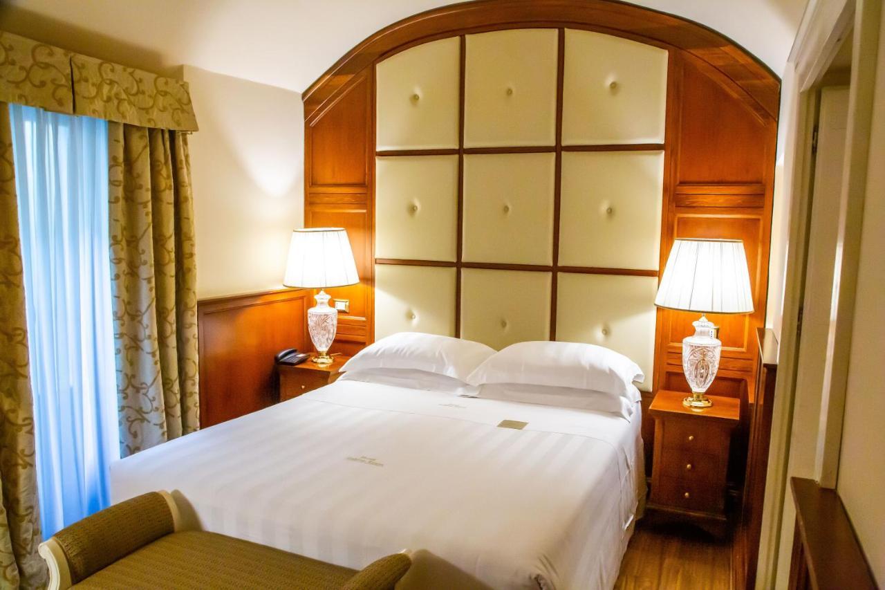 Golden Tower Hotel & Spa Флоренция Экстерьер фото A bedroom at the hotel