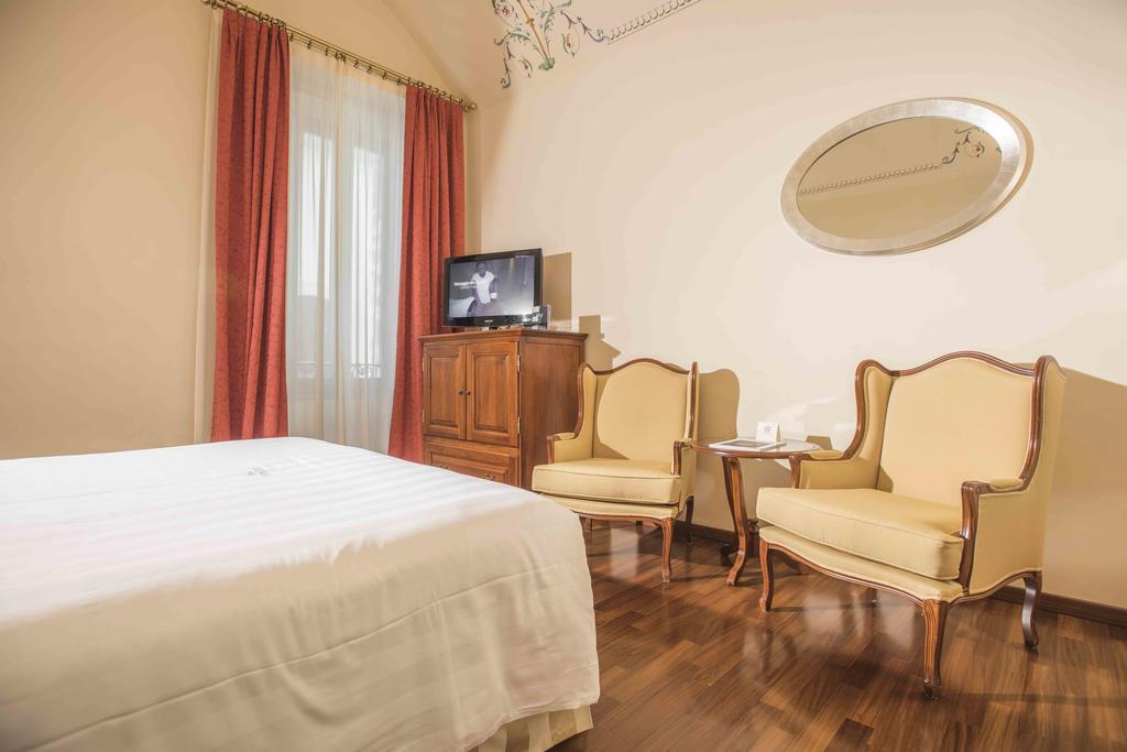 Golden Tower Hotel & Spa Флоренция Экстерьер фото A room at the hotel